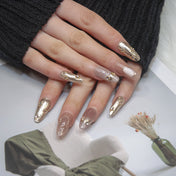Elegant nude nails with 3D metallic frames and rhinestone accents