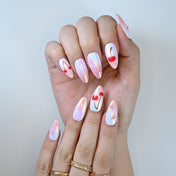  Y2K inspired press ons featuring hand-painted cherries, chrome shine and star sparkles