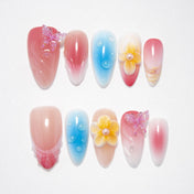 Pink blue gradient press-on nails with 3D yellow flowers and pink butterfly charms