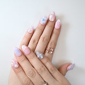 Mermaid-inspired press-on nails with shimmer, pearls, and starfish design