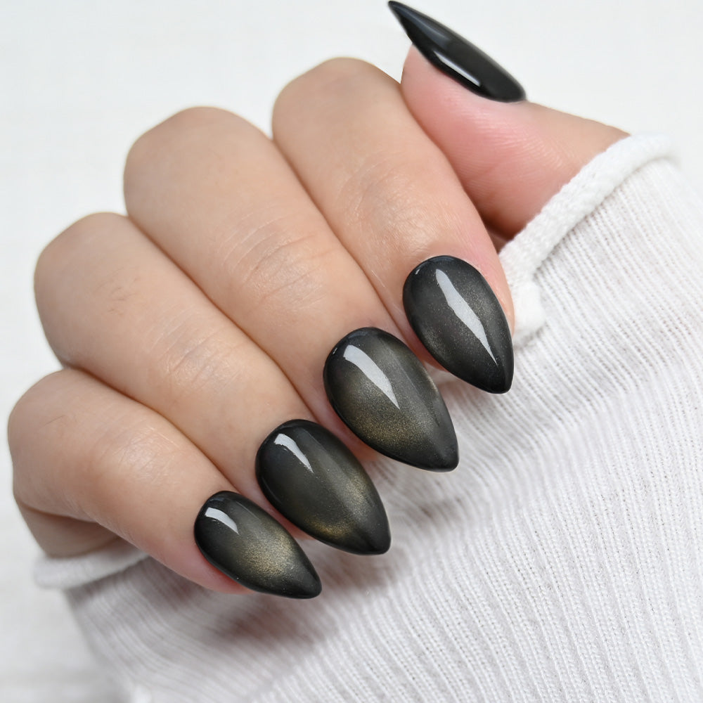 Handmade almond black shimmer nails, salon quality