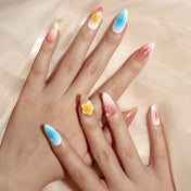Bright beach style press-on nails with gradient colors and 3D embellishments