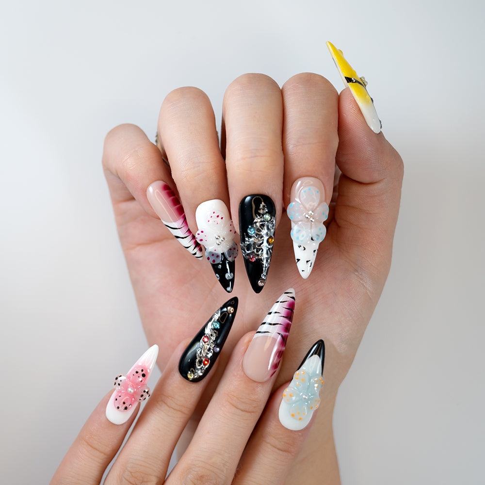 Long stiletto black and white gradient press-on nails with 3D flowers and rhinestones