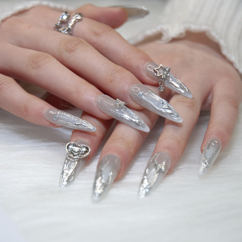 Luxury silver gradient nails with crystal star accents
