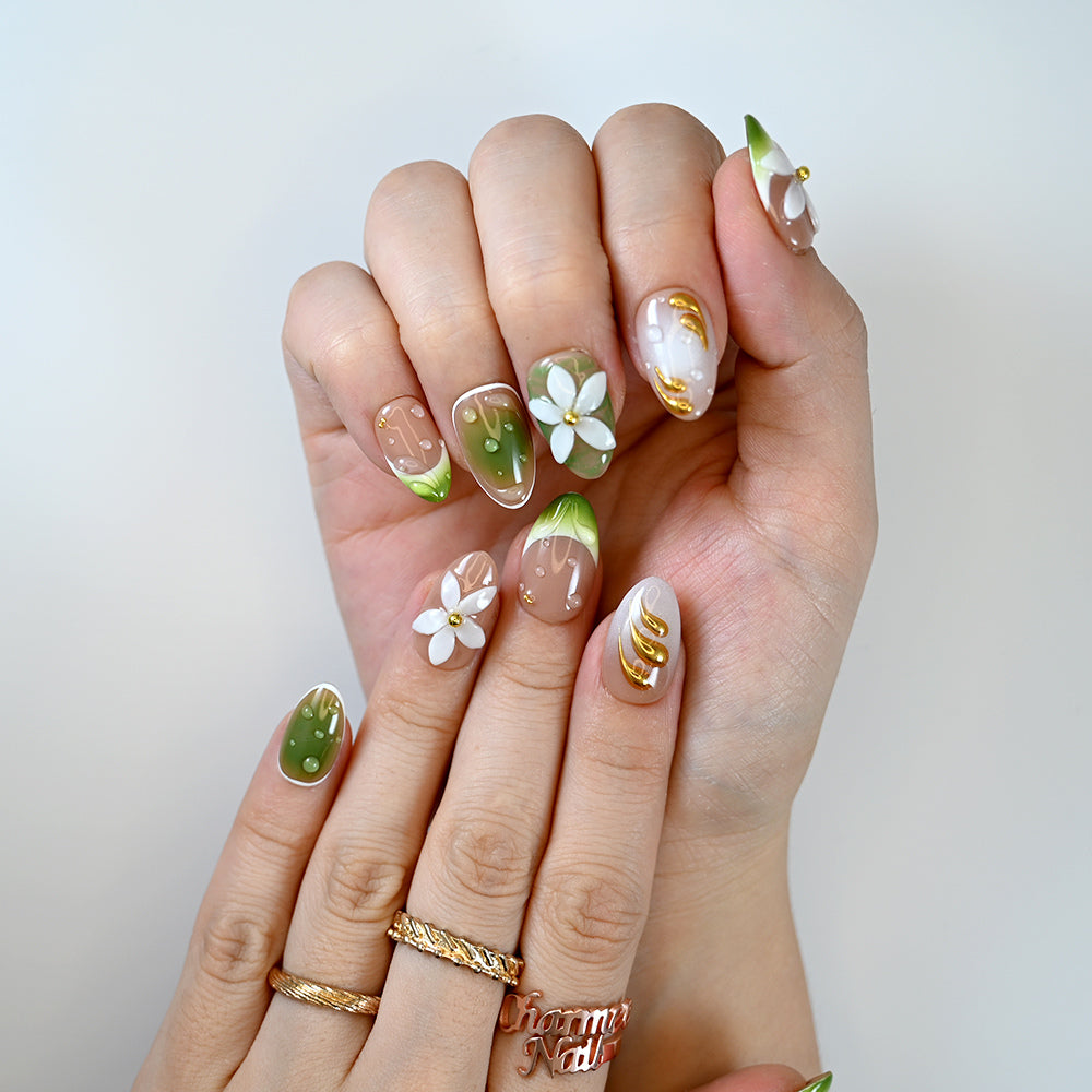  Nature-inspired almond-shaped press on nails with glossy finish and sculpted petals