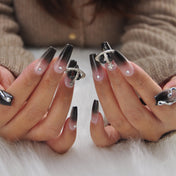 Edgy space theme press-on nails with ombre fade, silver art, and statement charm