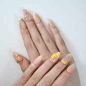 Medium almond press-on nails with 3D butterfly and starfish design in pastel tones