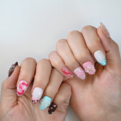 Valentine press-on nails with pink hearts, 3D bow, and chocolate brown accents