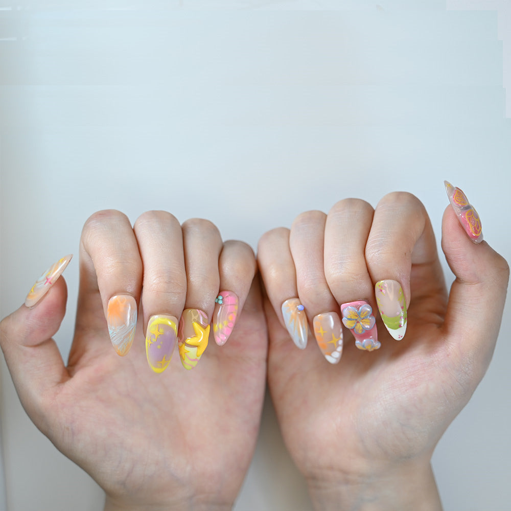 Summer beach press-on nails with warm gradient and 3D art