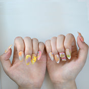 Summer beach press-on nails with warm gradient and 3D art