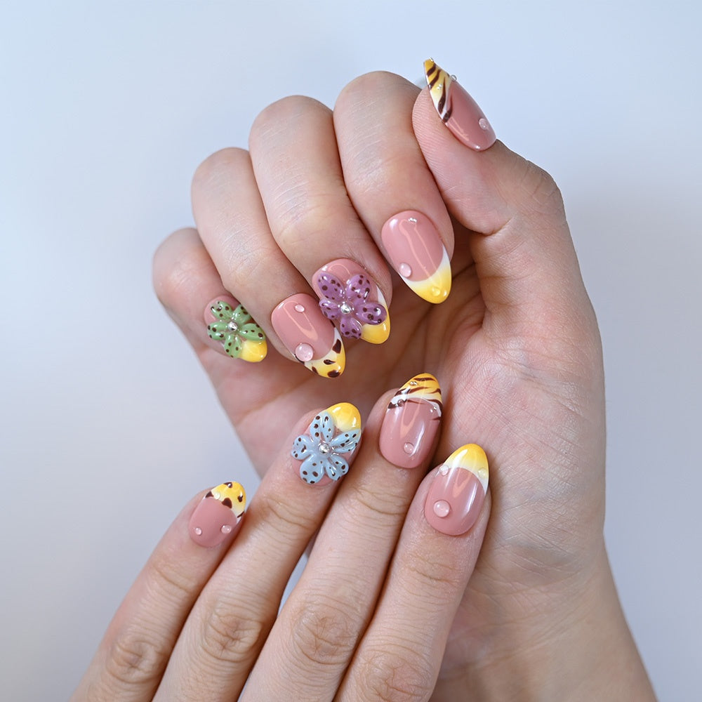 Cute nude nails with animal print and floral accents