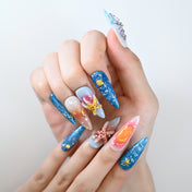 Summer vacation nails with starfish, butterfly, and tropical beach design