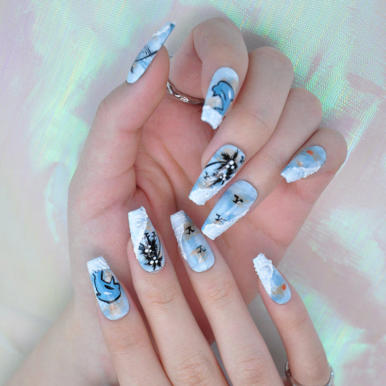 Blue summer press-on nails with tropical landscape and marine life art
