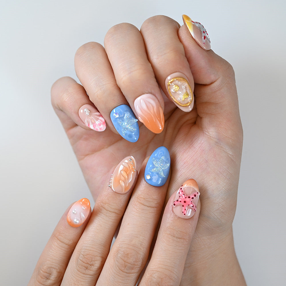  Summer ocean nails in coral orange and sea blue with marine accents