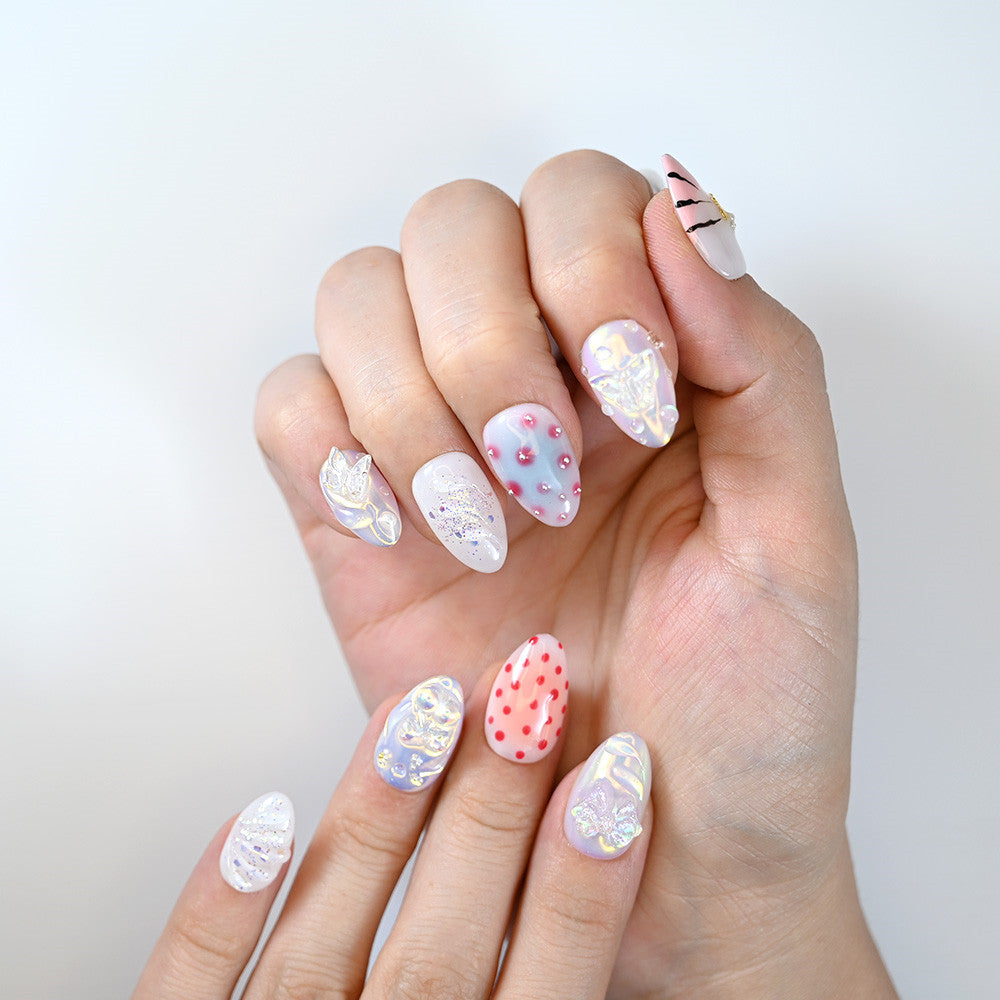 Pearl white press-on nails with 3D butterfly and pearl accents