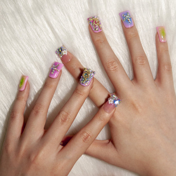 Sparkly crystal embellished nails with ombre pink to purple base