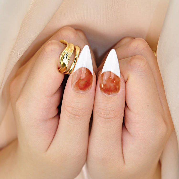 Chic animal print press-on nails with burgundy French tips and sparkling gems