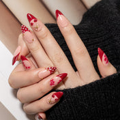 Cute cherry nail design with gold ribbon on glossy press-ons