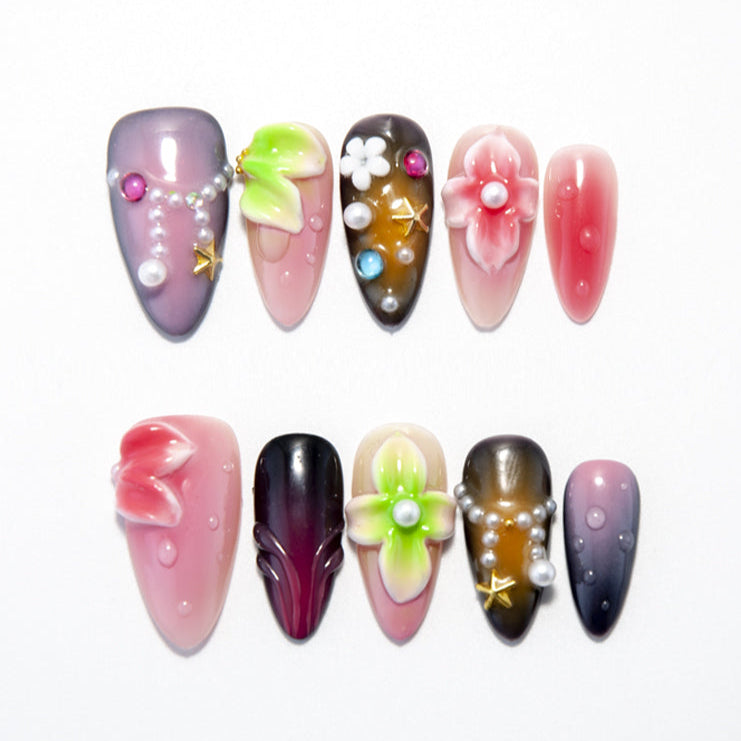 Gradient press-on nails with 3D flowers, pearls, and starfish charms