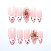French tip press-on nails with brown leopard print and 3D flower