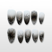 Black and white gradient press-on nails with silver 3D abstract line art
