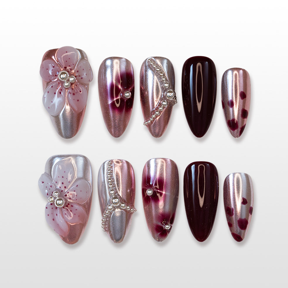 Metallic wine red press-on nails with 3D pink flower and silver pearl accents