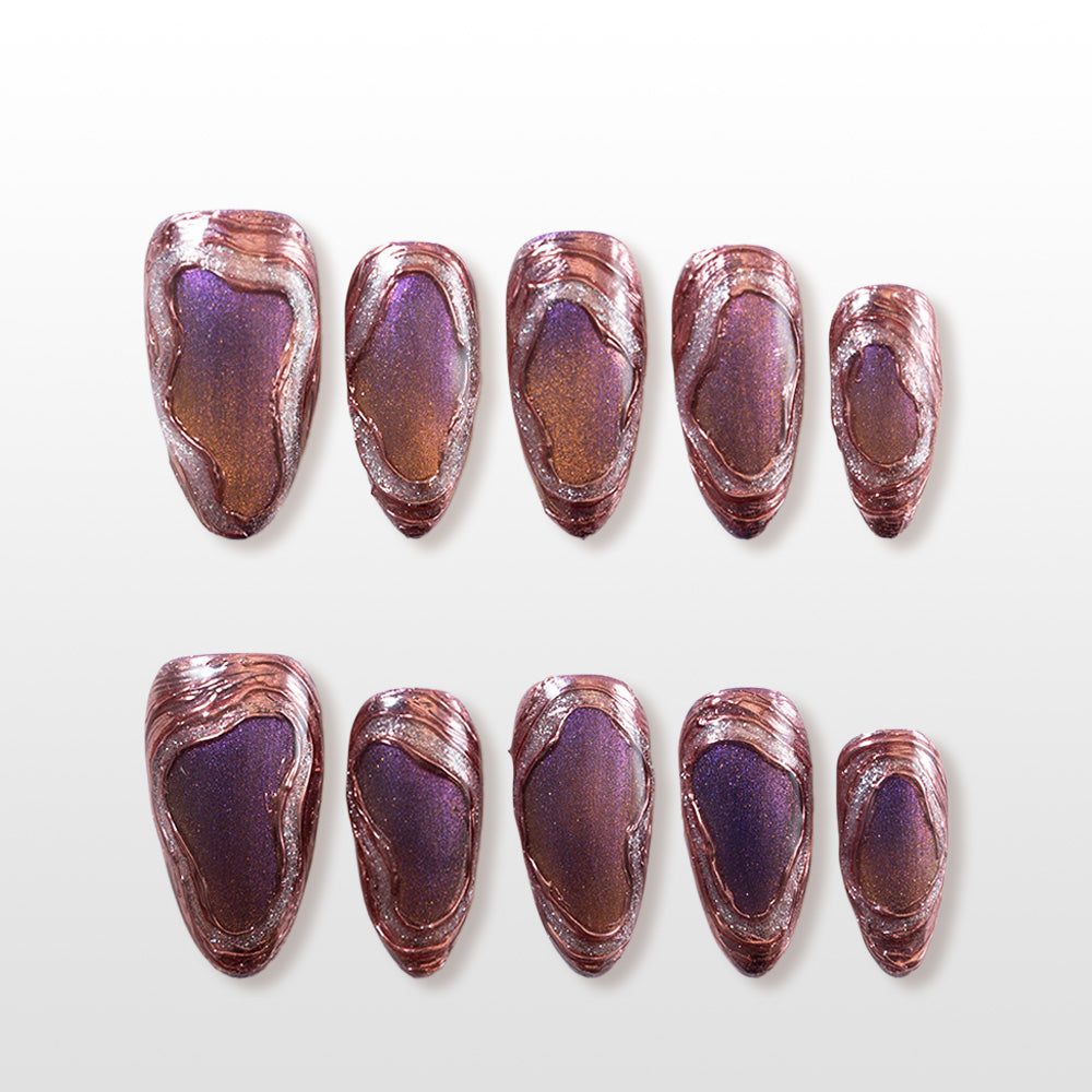 Metallic copper and purple press-on nails with abstract swirl texture and glossy finish