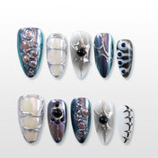 Metallic chrome press-on nails with 3D silver bubble design and galaxy accents