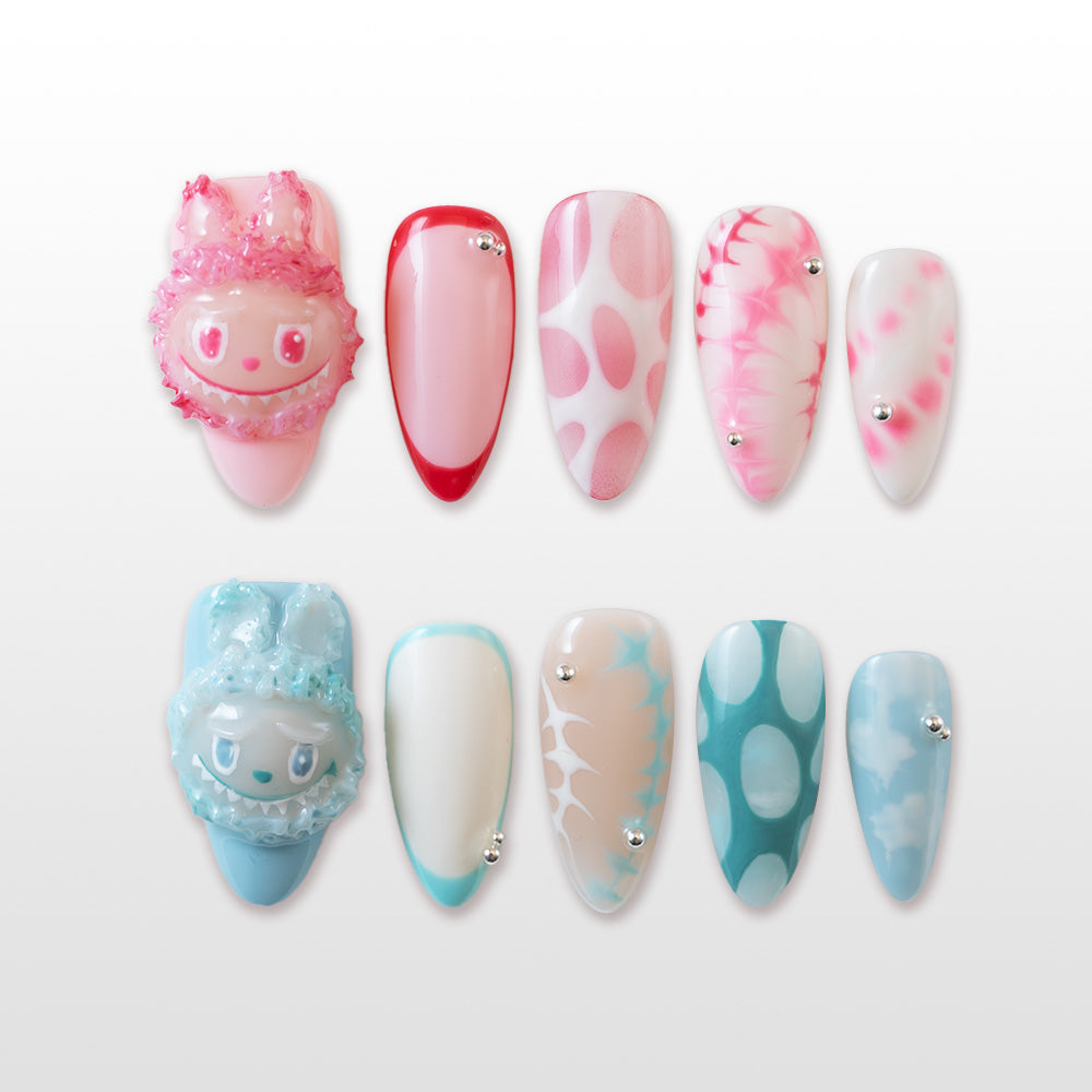 Cute cartoon bunny press-on nails in pink and blue with 3D details