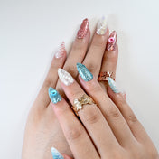 Mixed rose gold and turquoise press-on nails with marble glitter and pearl 
