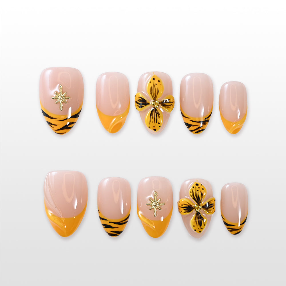 Tiger stripe and yellow flower press-on nails with gold star accents