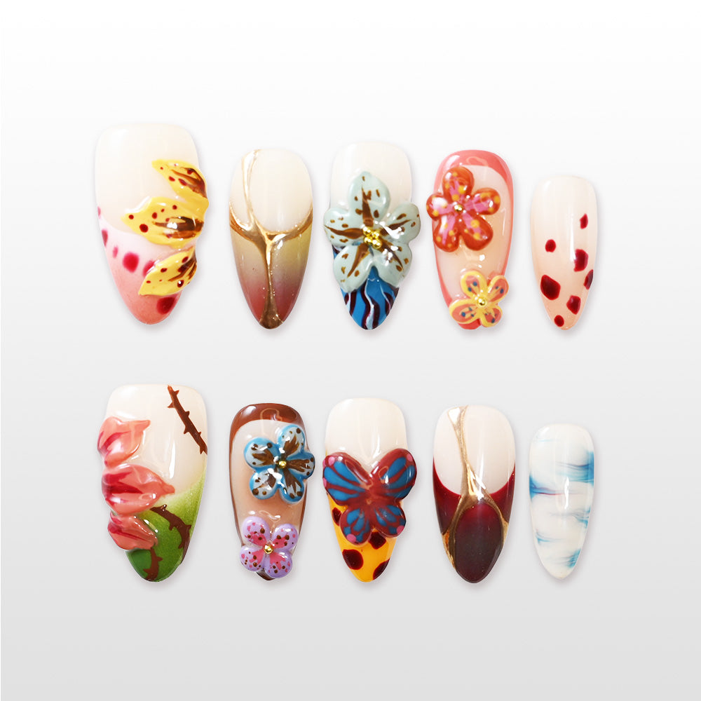 Colorful 3D flower and butterfly press-on nails with hand-painted patterns and gold accents