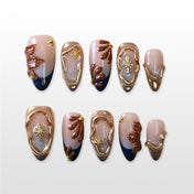 Navy French tip press-on nails with 3D gold starfish and gemstone effect