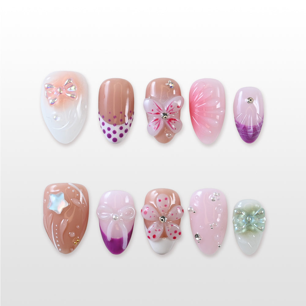 Handmade glossy nails featuring polka dot petals, crystal star charm and butterfly accents