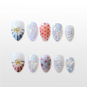 Cute candy-colored press-on nails with 3D bow and butterfly accents