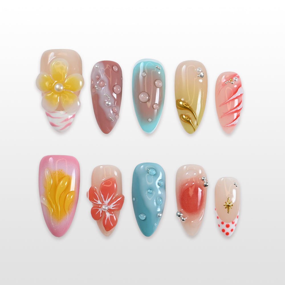 Medium almond vacation nails with tropical flower and shimmer design