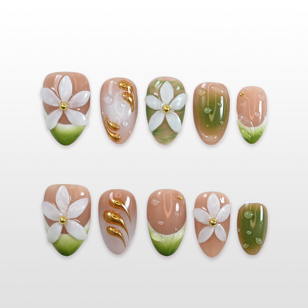 Charmeenail spring green press on nails with white daisy flowers and gold foil accents