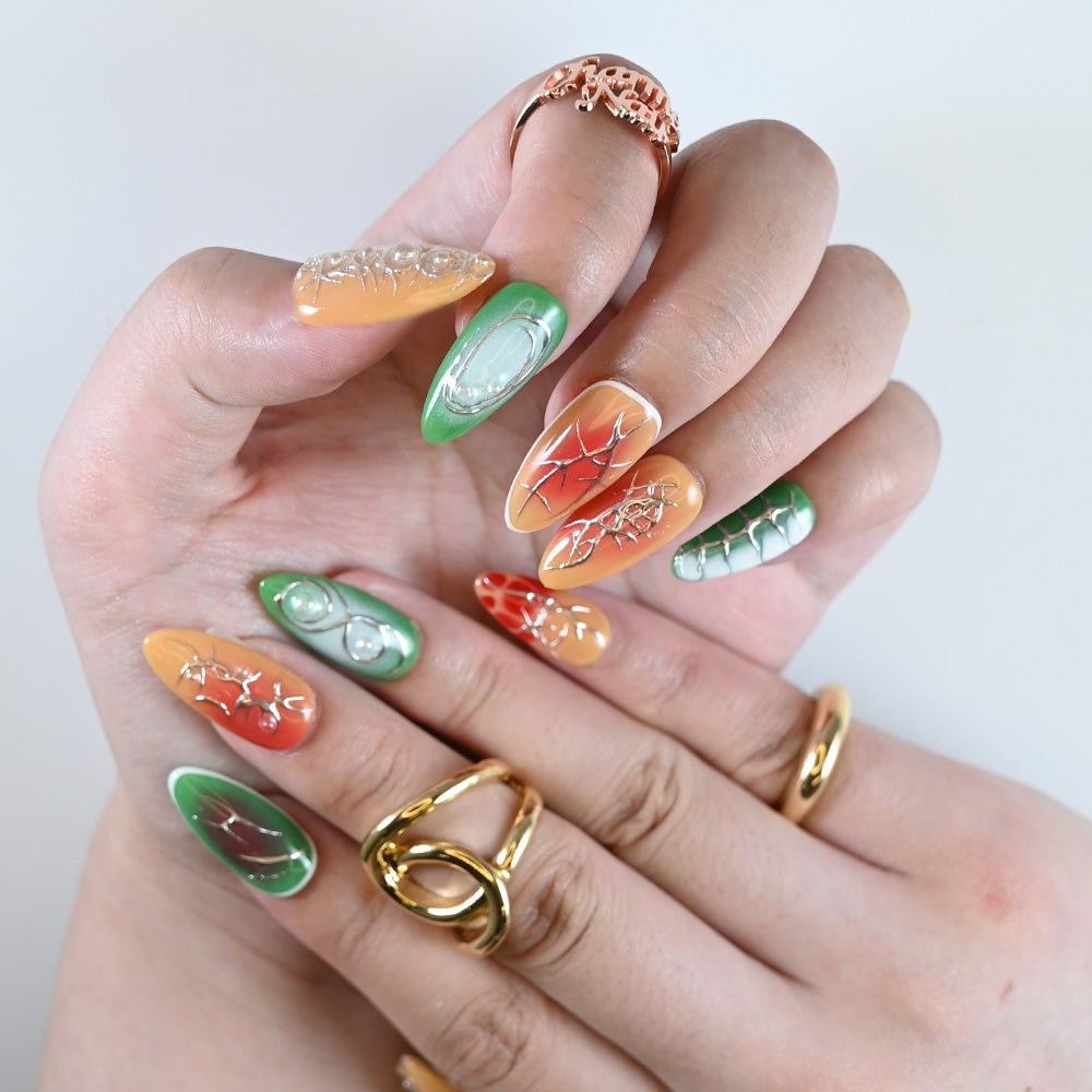 Handmade almond-shaped press on nails featuring lava cracks, abstract textures, and jelly details