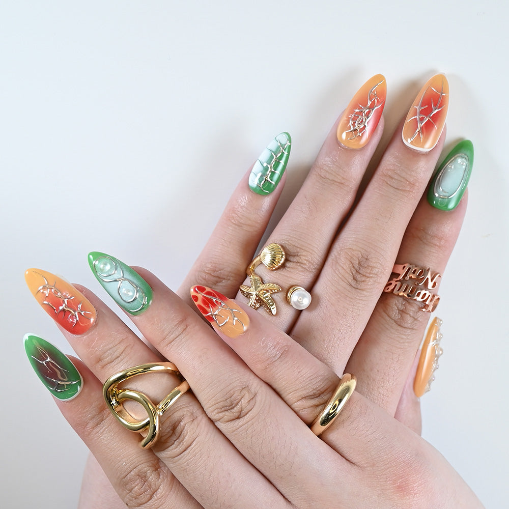 Handmade almond-shaped press on nails featuring lava cracks, abstract textures, and jelly details