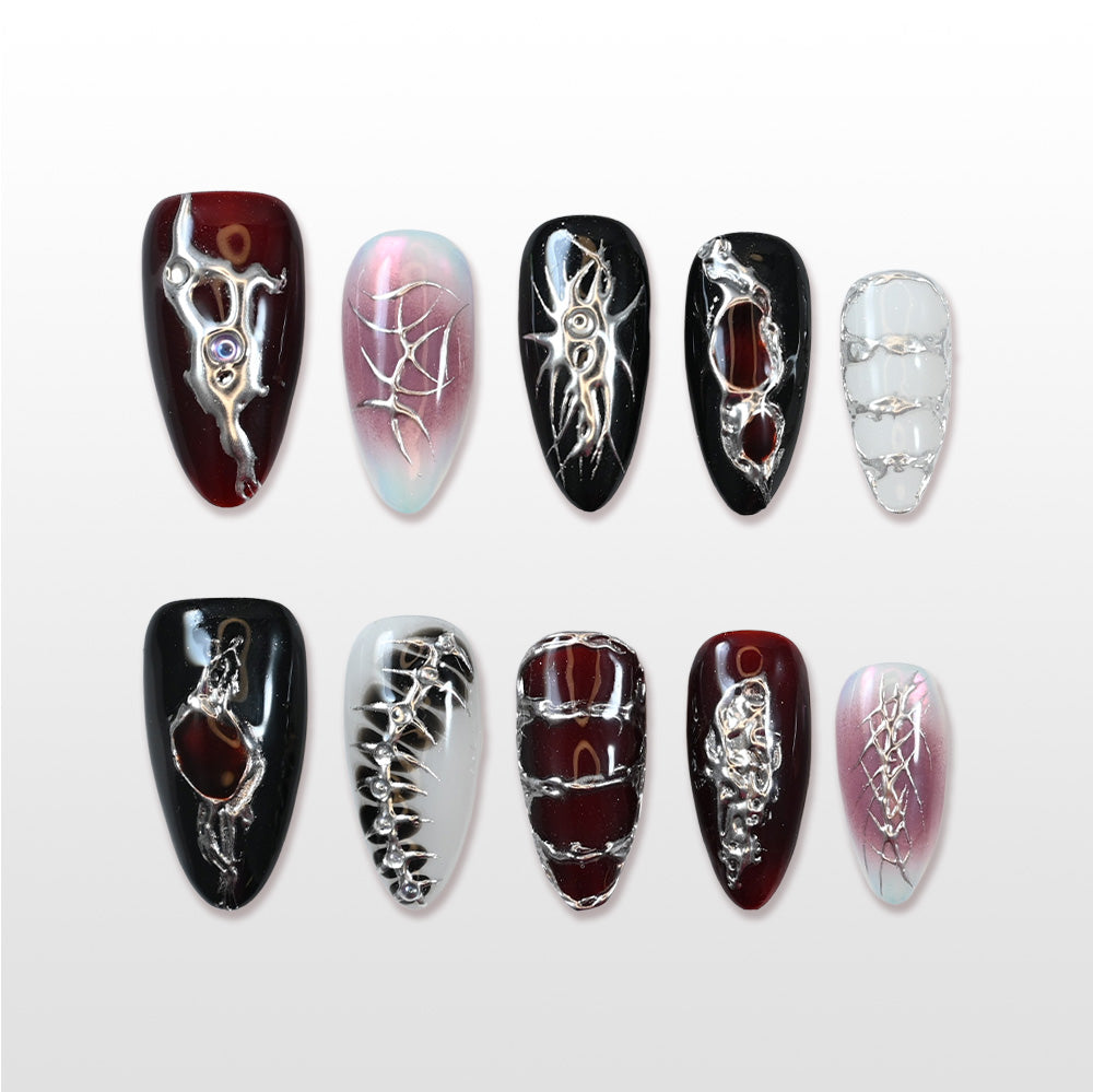 Charmeenail edgy press on nails with silver metal textures, spiderweb patterns, and black-red tones