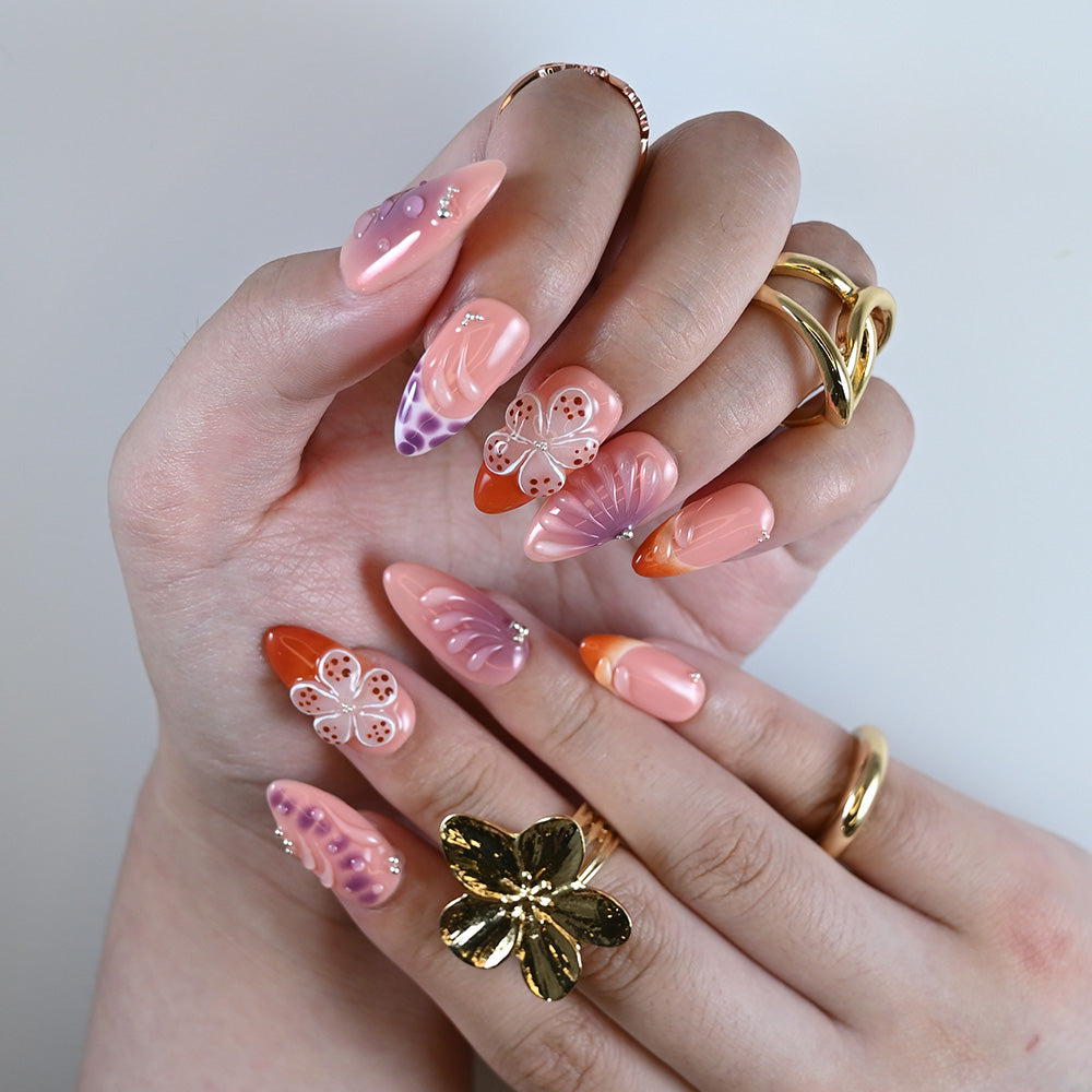 Almond-shaped nails featuring butterfly art, glossy finish, and dreamy pastel colors