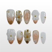 Charmeenail bridal press on nails with white 3D flowers and gold metallic accents
