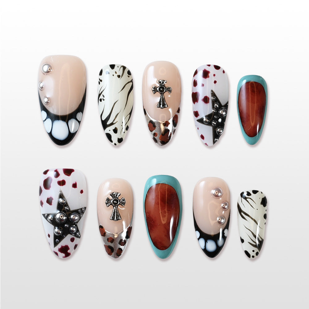 Charmeenail leopard and zebra pattern nails with teal French tips and 3D embellishments