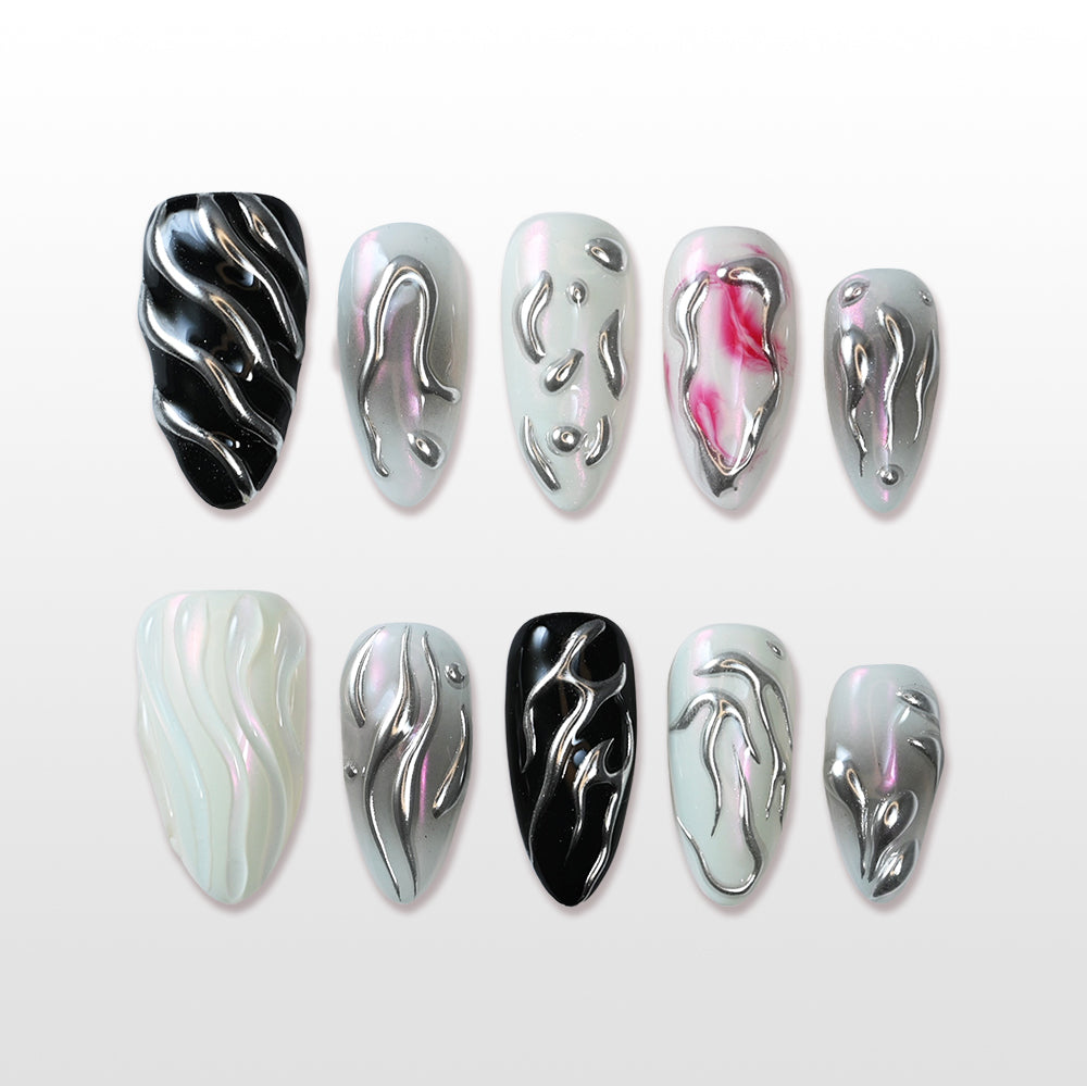 Charmeenail sculpted chrome press on nails with flame-inspired silver 3D accents