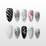 Charmeenail sculpted chrome press on nails with flame-inspired silver 3D accents