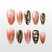 Charmeenail sculpted nail set featuring metallic wire details, beads, and molten patterns