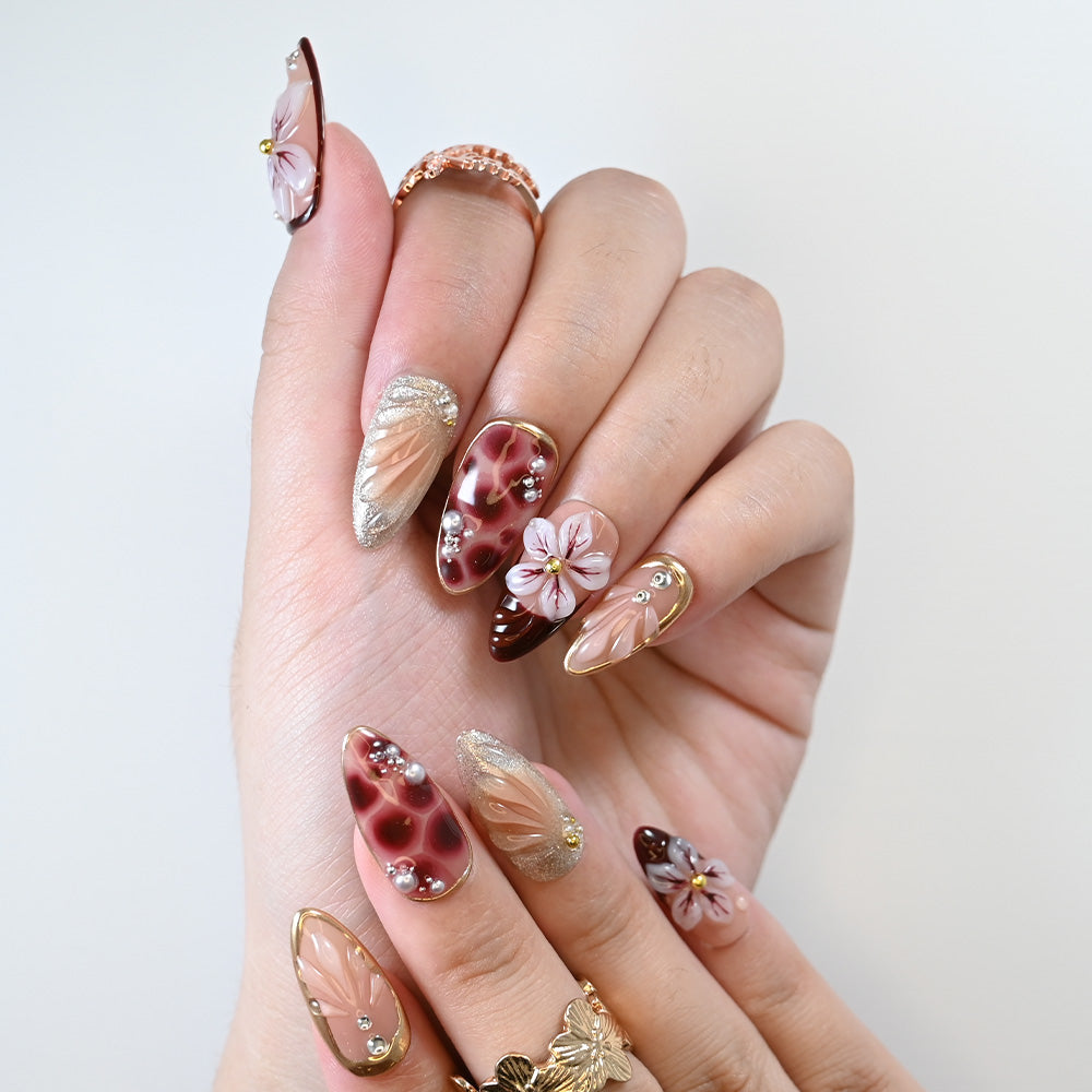 Reusable flower design press-on nails with pearl and crystal decorations