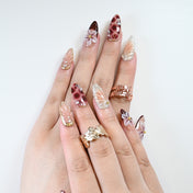 Salon-quality burgundy and nude gradient nails with 3D blossoms