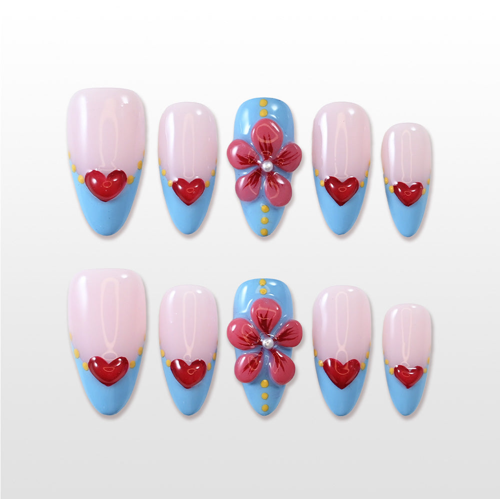 Pink and blue press-on nails with 3D red heart and flower design