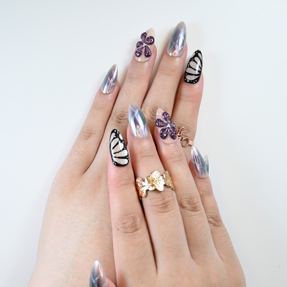 Reusable press-on nails featuring butterfly pattern and glitter shine